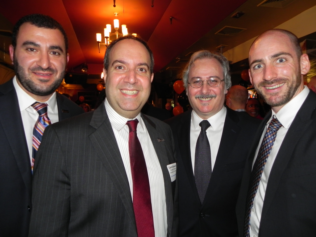 Carlo Scissura (second from left), president and CEO of the Brooklyn Chamber of Commerce, received a civic award for his work on behalf of the community. He is pictured with chamber executives Joseph Shaia, Rick Russo, and Andrew Steininger (left to right) Brooklyn Eagle Photos by Paula Katinas