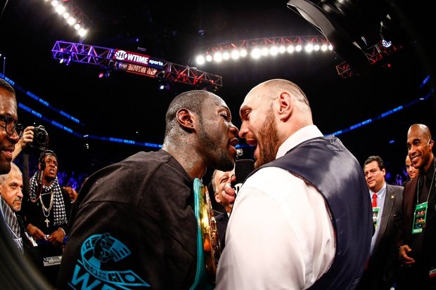 WBC Heavyweight Boxing Champion Deontay Wilder goes face to face with WBO and WBA Boxung Champ Tyson Furry after Wilder defended his crown with a pth round knockout at Barclays Center Saturday night. 