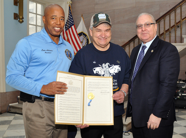 At a ceremony with Borough President Eric Adams, Assemblyman Steven Cymbrowitz presented an Assembly Resolution proclaiming March as Colon Cancer Awareness Month to Dan Foster, a 20-year survivor. (Photo by Erica Sherman/Brooklyn BP’s Office). 
