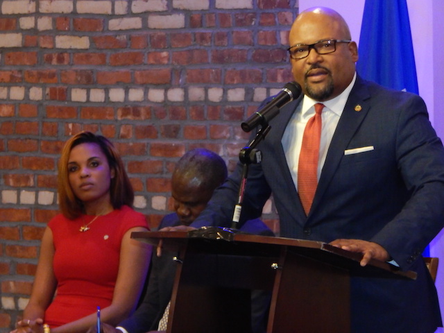 Haitian General Consul General Peter Helder Bernard addresses the crown at the Bridge Multicultural Advocacy Project Center in Flatbush.