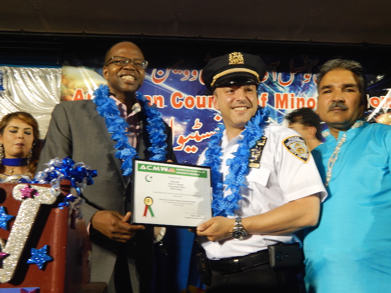 Brooklyn District Attorney Ken Thompson, left, and local police officials were among those that received certificates of appreciation at last night's Chand Raant Bizaar.
