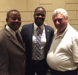 From left are former 42nd Assembly District Democratic Leader Ed Powell, current District Leader Josue Pierre, and Kings County Democratic Party Chair Frank Seddio.