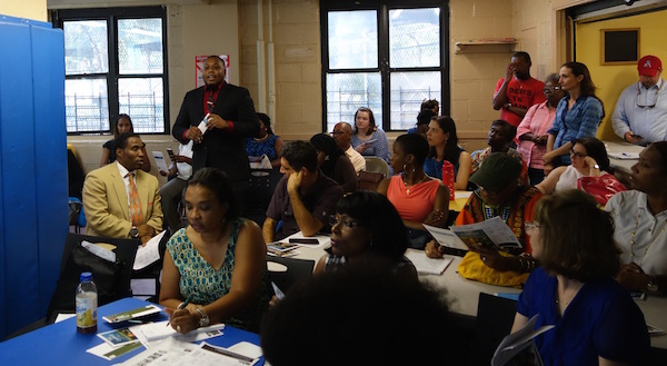 Organizers and Brownsville community members discus 'The Campus" initiative. 