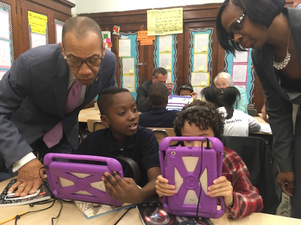 Officials help students of P.S. 67 in Fort Greene gain access to the web. Photo by Emily Glass