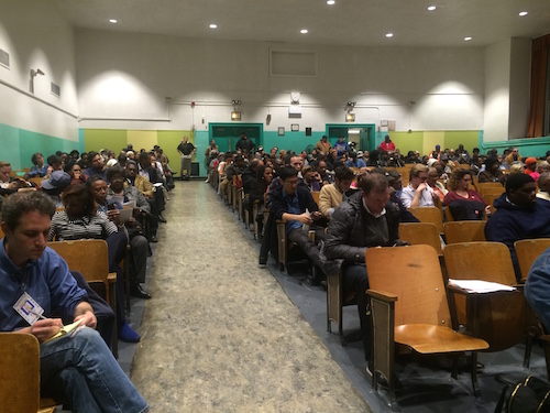 Several hundred Crown Heights residents turned up on the meeting concerning the Bedford Armory. Photo By Kelly Mena