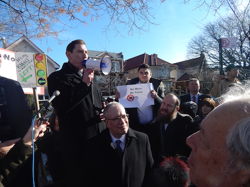 City Councilman Chaim Deutsch addresses the rally. Photo by Michael Wright