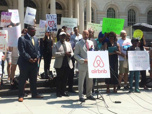 Minister Foy leading a rally of Airbnb Hosts at New York City Hall