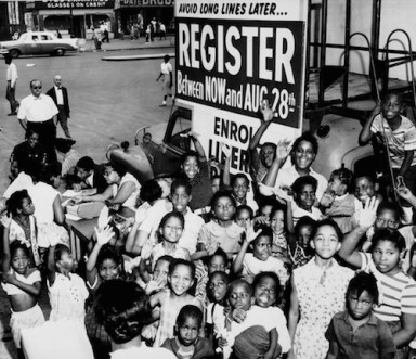 Register_to_vote_African_American_1960s_sign