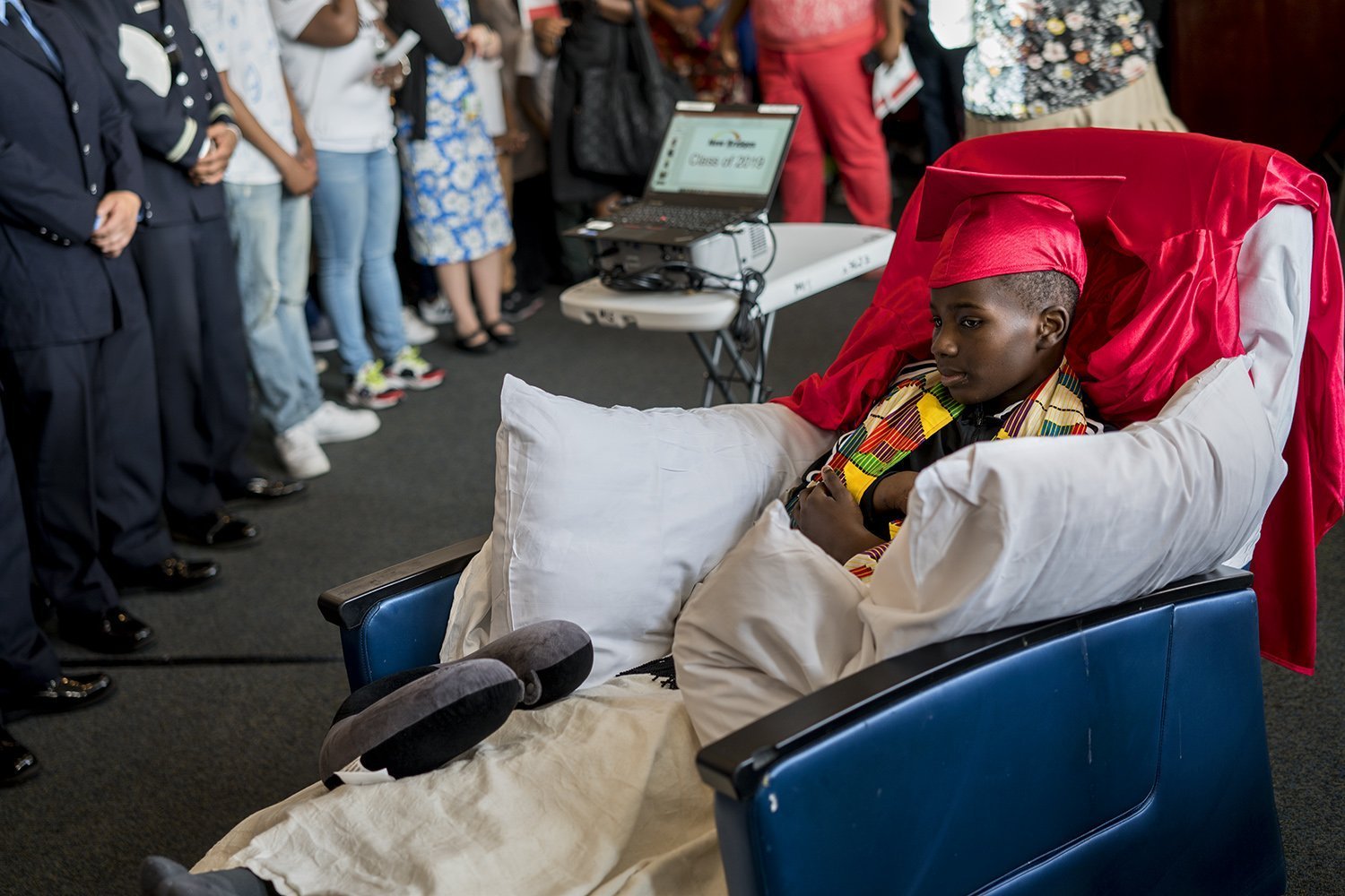 Nearly a hundred of police officers, community organizers, reporters, and friends and family gathered to celebrate Jayden's graduation (Photo by Tsubasa Berg).