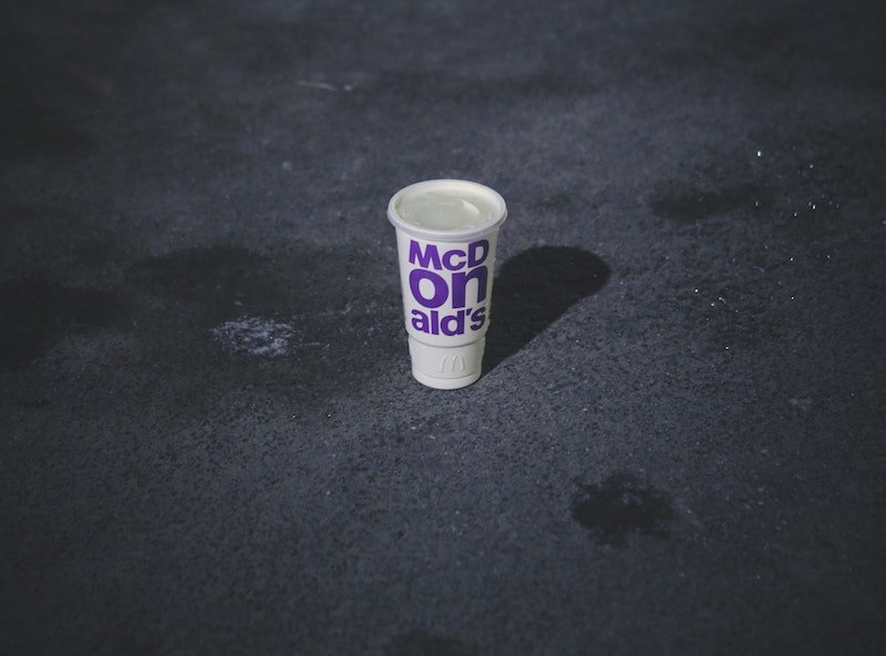 plastic-cup-of-mcdonalds-on-the-ground-3391856