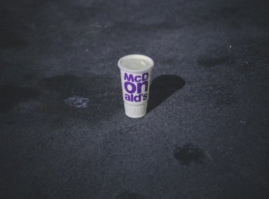 plastic-cup-of-mcdonalds-on-the-ground-3391856