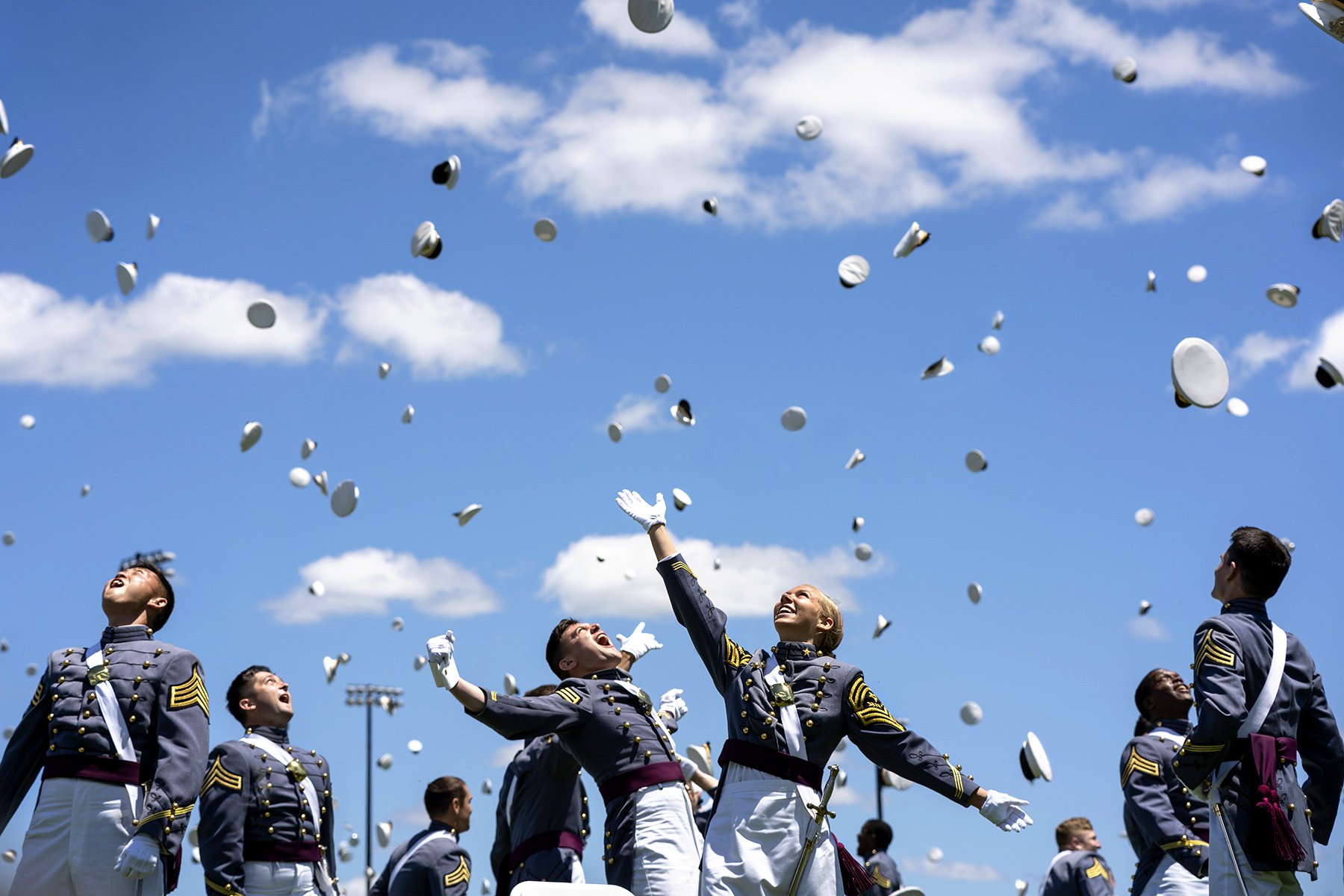 Cadets toss their hats into the air after their graduation and commissioning ceremony at the academy in West Point, N.Y. (Photo by Tsubasa Berg)