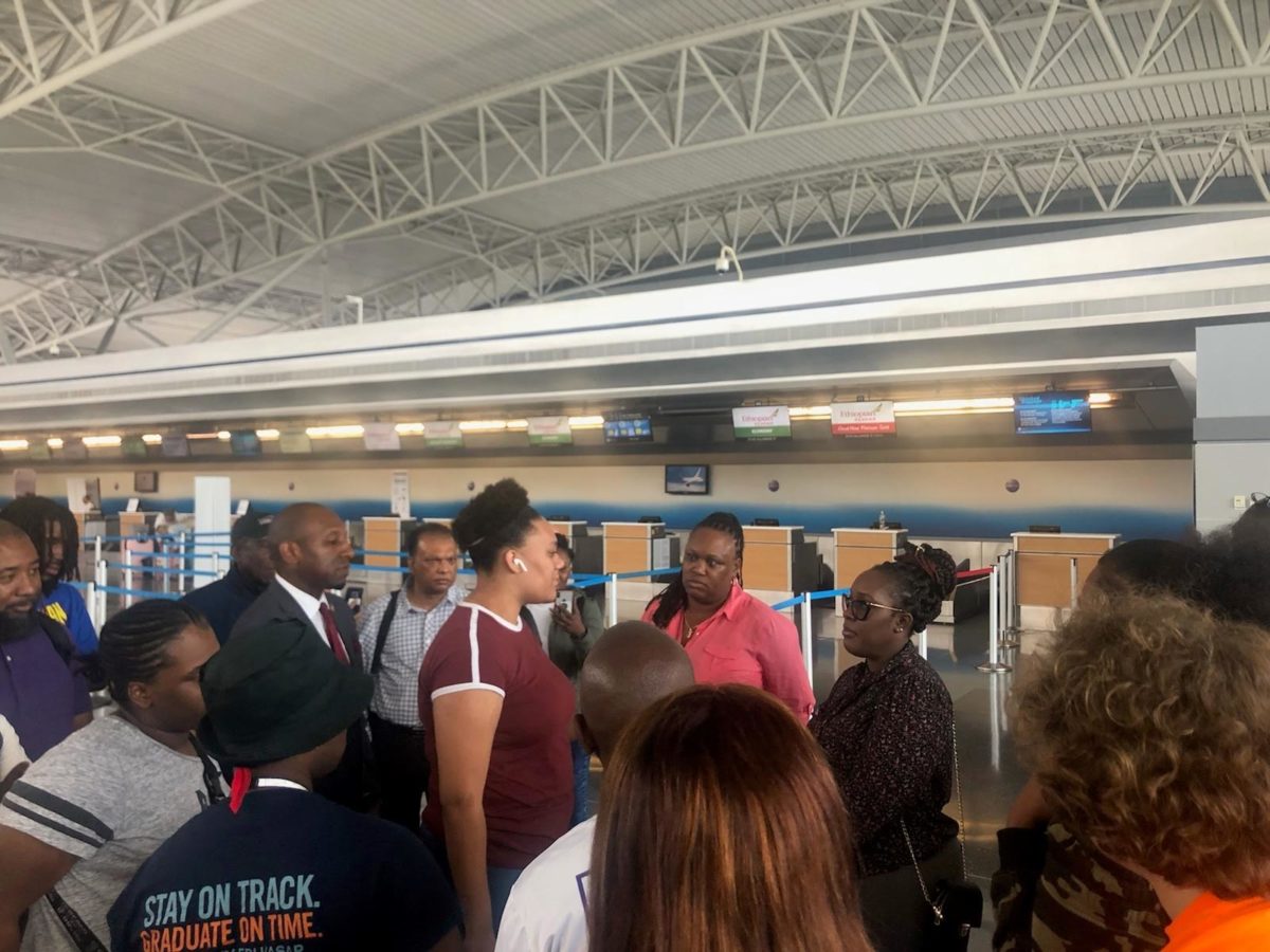 JFK workers demand wage records from private contractor