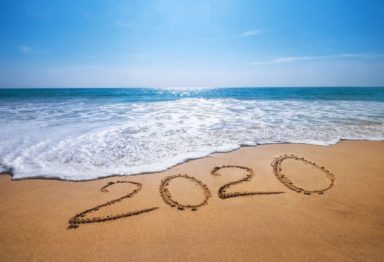 Happy New Year 2020 is coming concept sandy tropical ocean beach