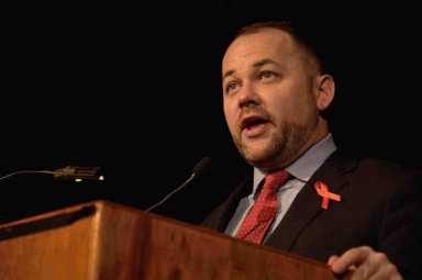 Corey-johnson-red-ribbon-1024×681-1