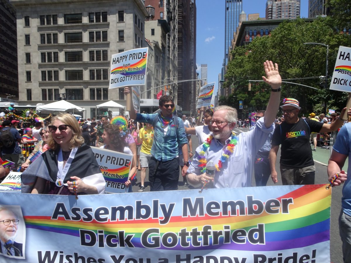 Assemblyman Richard Gottfried waves to the scores of LGBTQ New Yorkers and their allies.