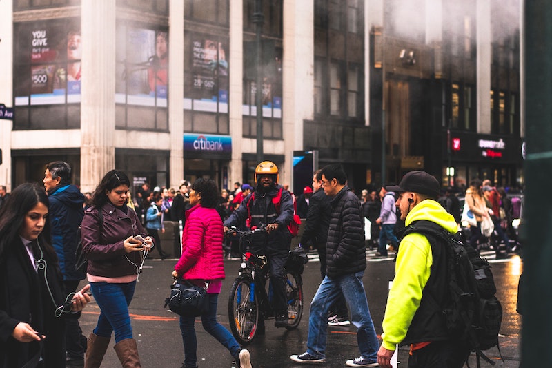 group-of-people-walking-on-road-1739456