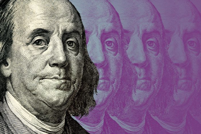 The image of Benjamin Franklin of U.S. hundred dollar bill with afterimage of it repeated behind it.