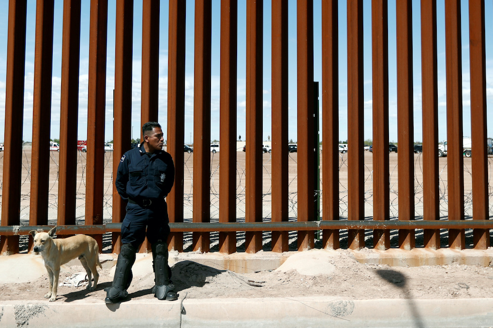 FILE PHOTO: A Mexican federal police member stands guard near the U.S.-Mexico border in 2019