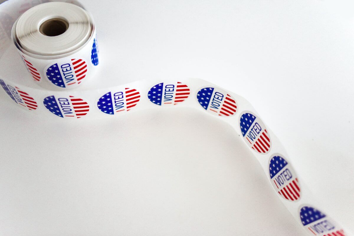 i-voted-sticker-spool-on-white-surface-1550336-1200×801-1