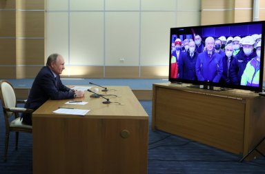 Russian President Vladimir Putin takes part in a ceremony via a video link in Sochi