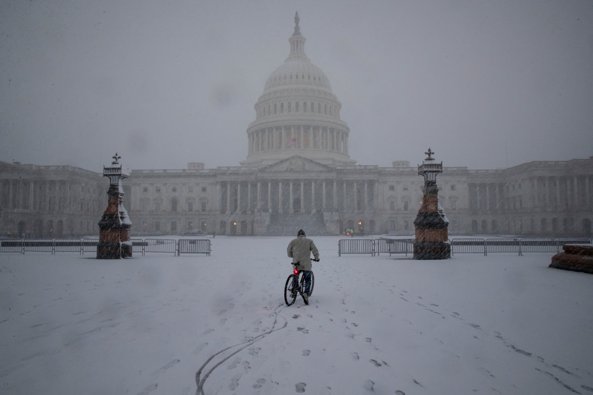 Snow falls during a winter storm on Capitol Hill, in Washington