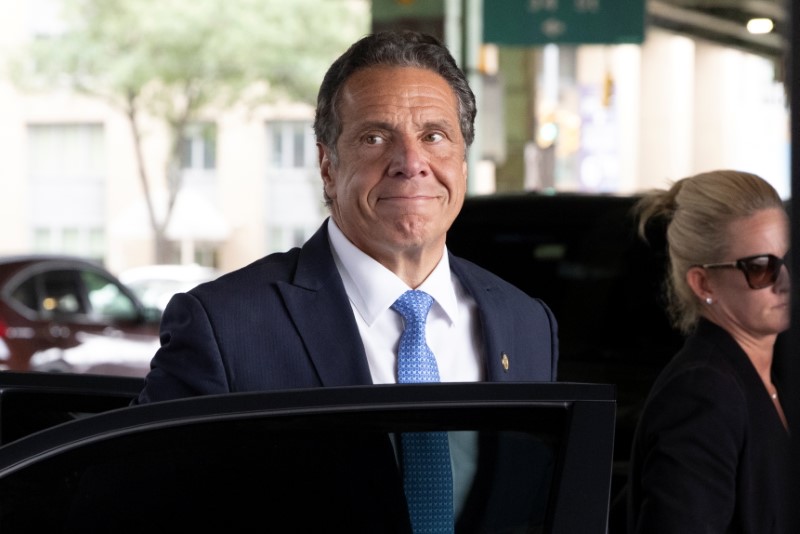 FILE PHOTO: New York Governor Andrew Cuomo arrives to depart in his helicopter after announcing his resignation in Manhattan, New York City