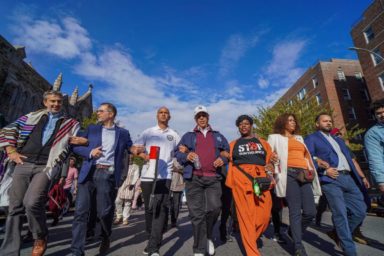 ‘Bullets know no borders’: Peace march from Washington Heights to Bronx sounds call to stop gun violence together